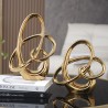 Figura Decorativa Nudo Infinito Small Gold